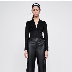 Black v-neck body suit